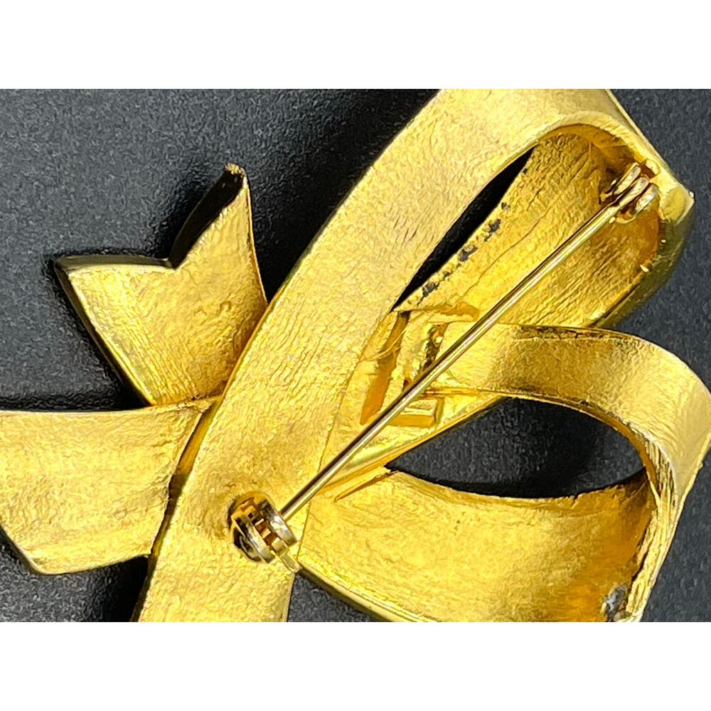Vintage Gold Tone Rhinestone
Double Ribbon Brooch Pin
Unbranded - Picture 7 of 9